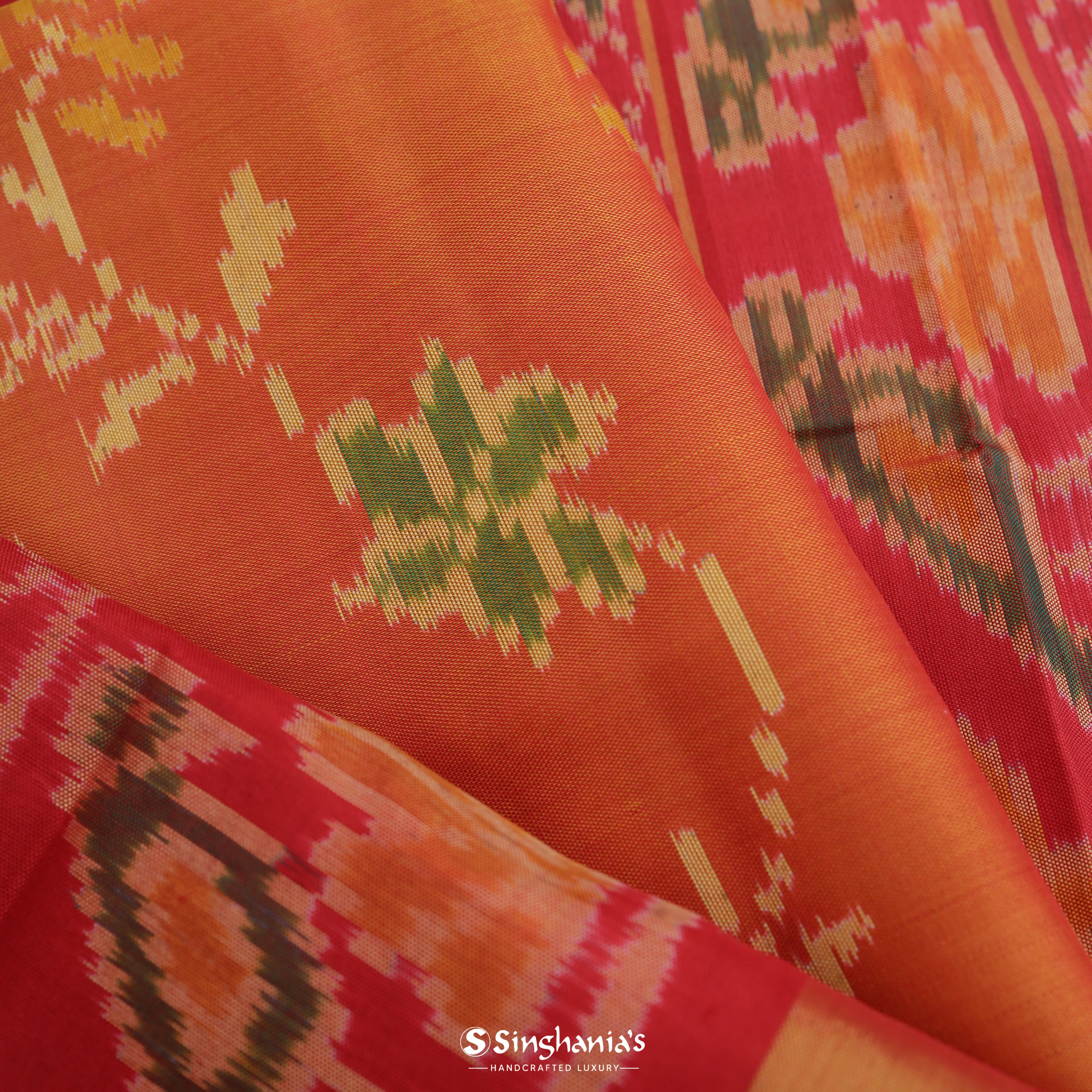 Safety Orange Patola Silk Saree With Floral Ikat Pattern