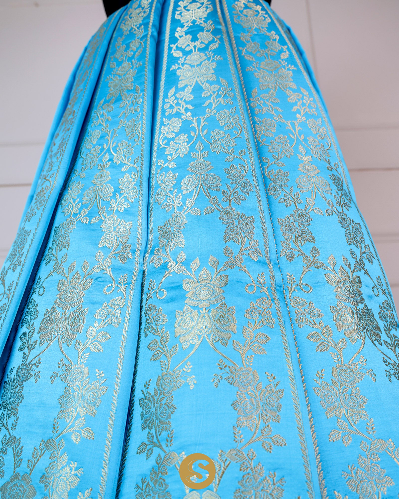 Capri Blue Unstitched Lehenga With Floral Zari Weaving