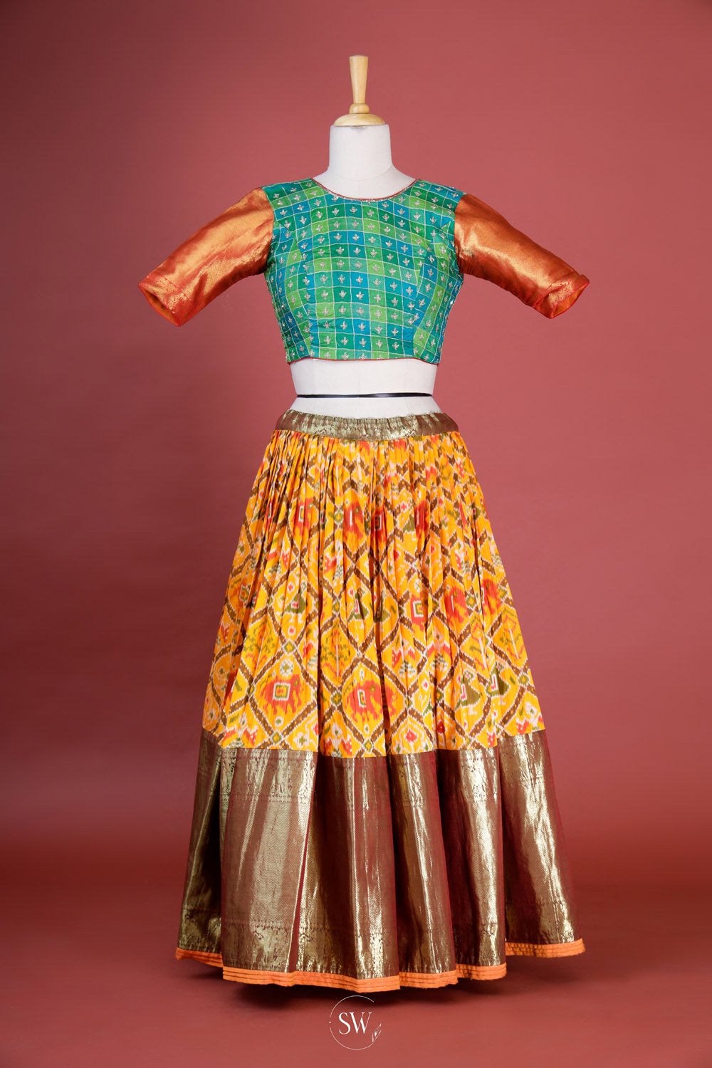 Saffron Yellow Ikat Patola Silk Lehenga Set With Zari Weaving
