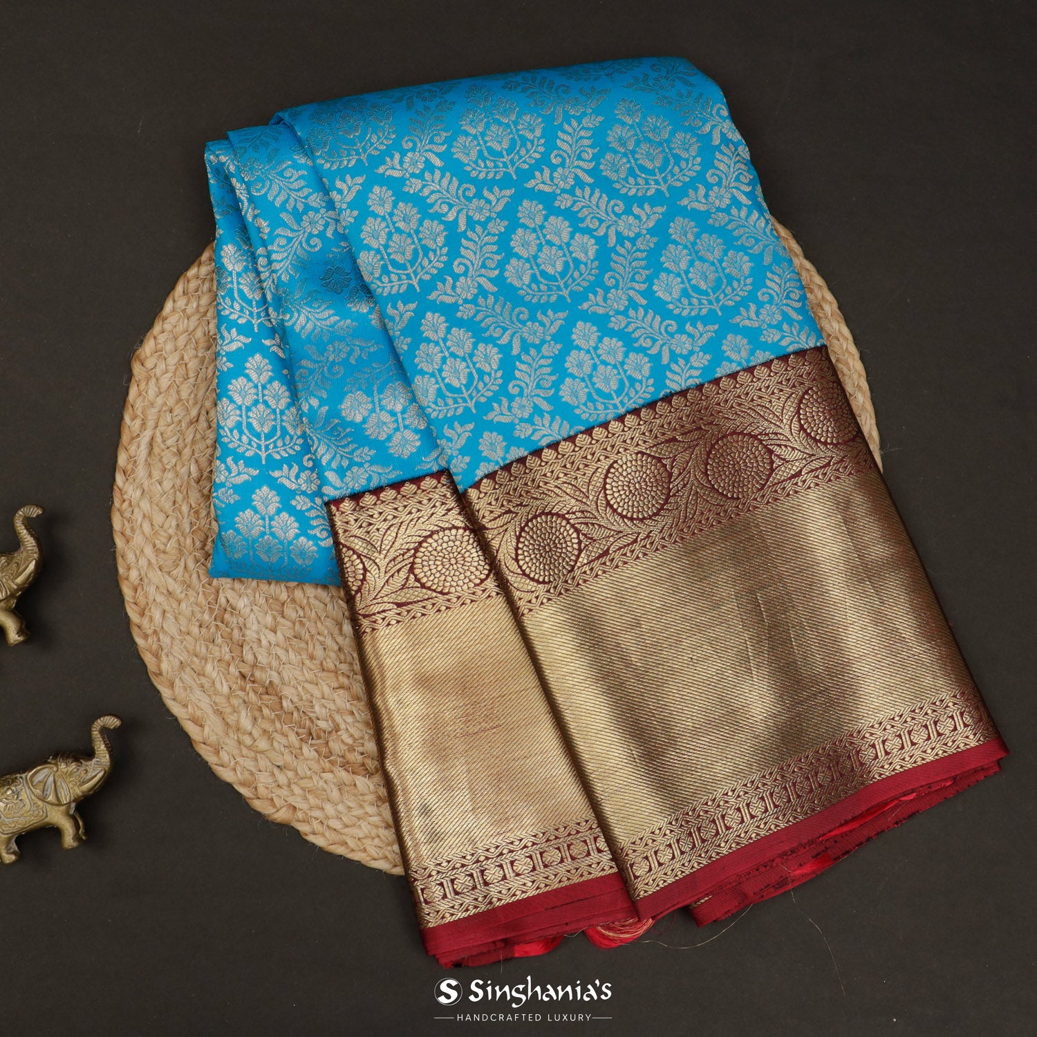 Vivid Sky Blue Kanchi Saree With Floral Butti Pattern