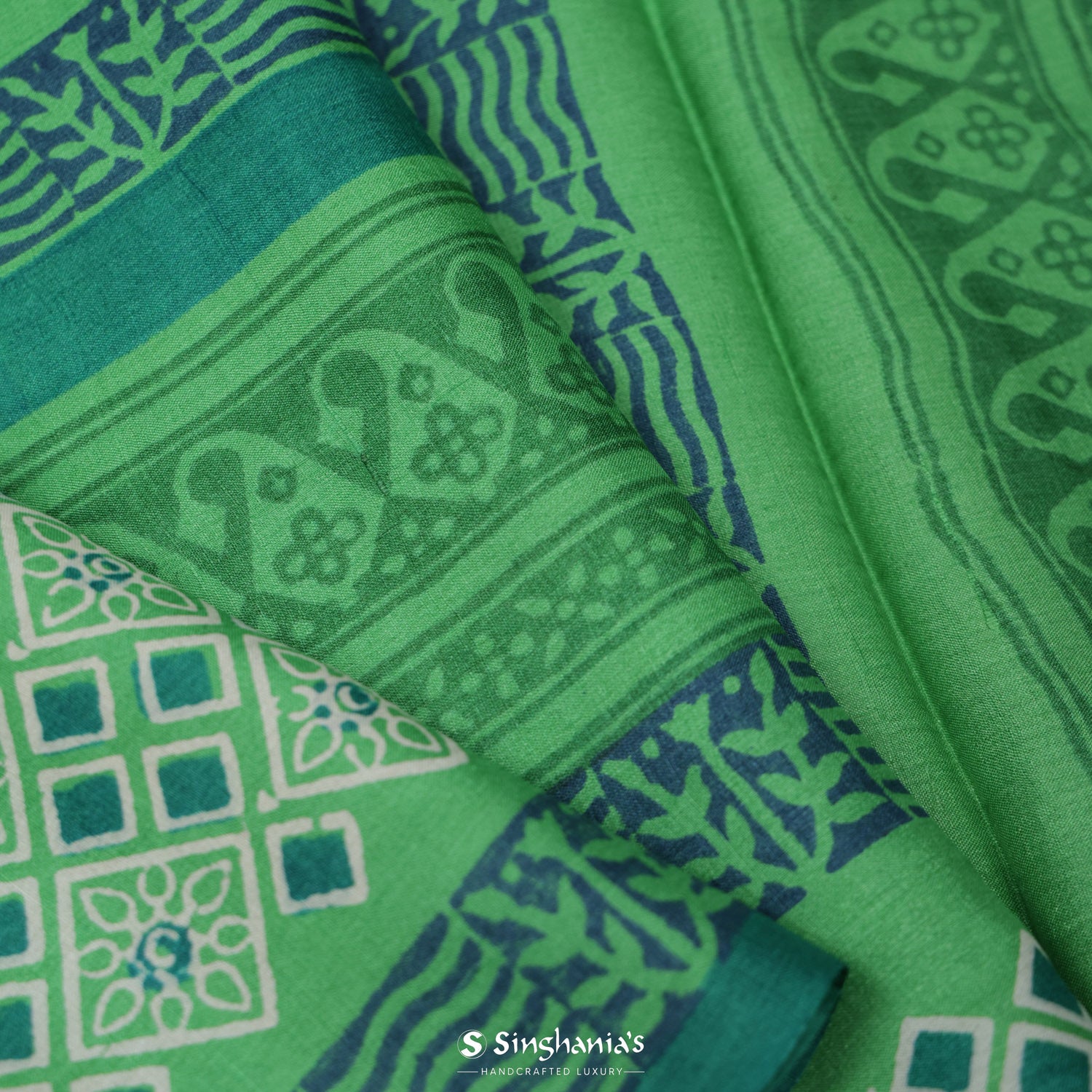 Iguana Green Printed Tussar Saree With Abstract Pattern