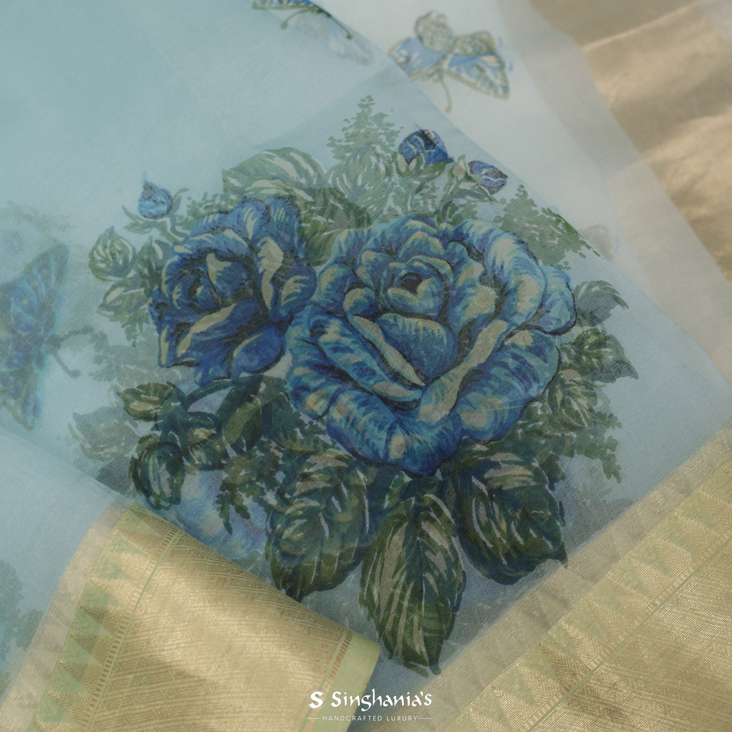 Sky Blue Printed Organza Saree With Floral Buttas