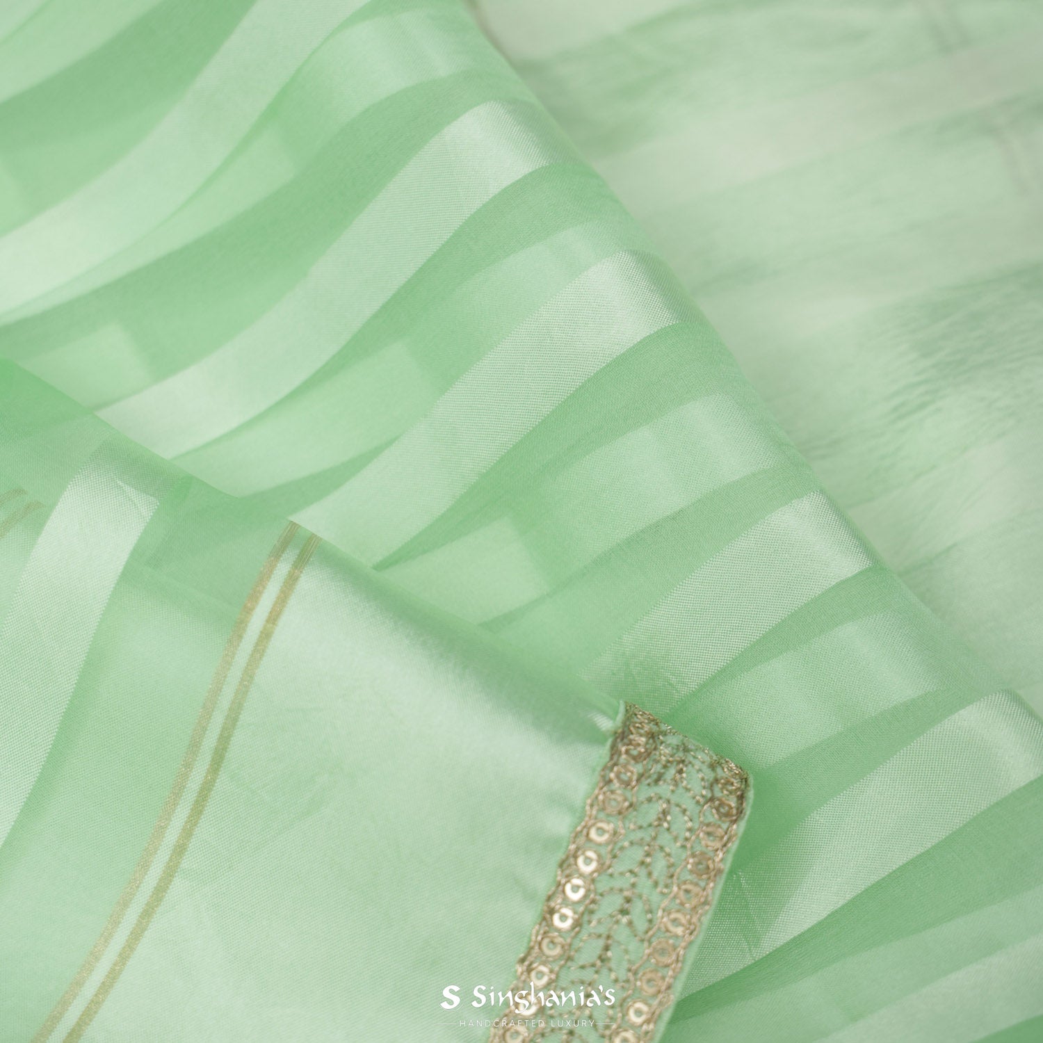 Celadon Green Plain Organza Saree With Embroidery Border