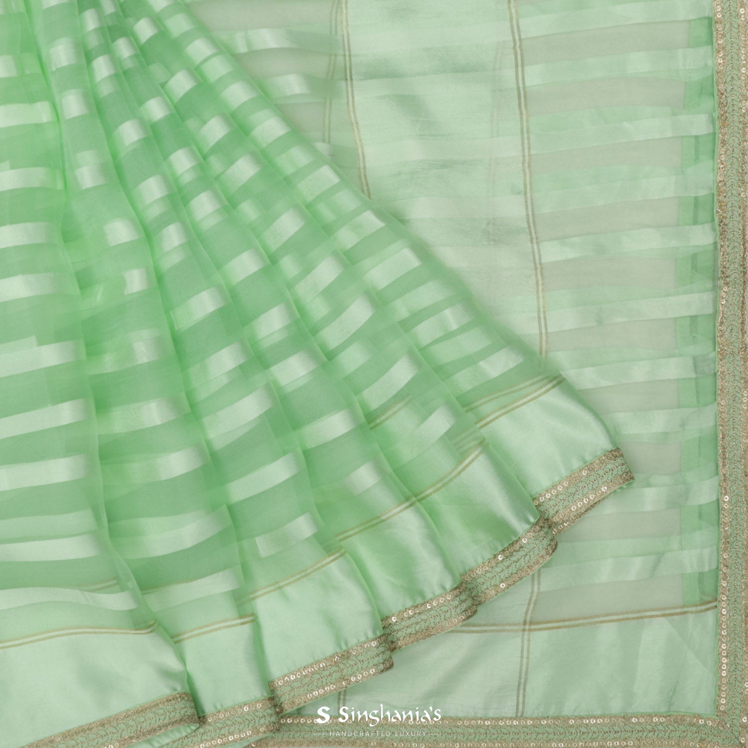 Celadon Green Plain Organza Saree With Embroidery Border