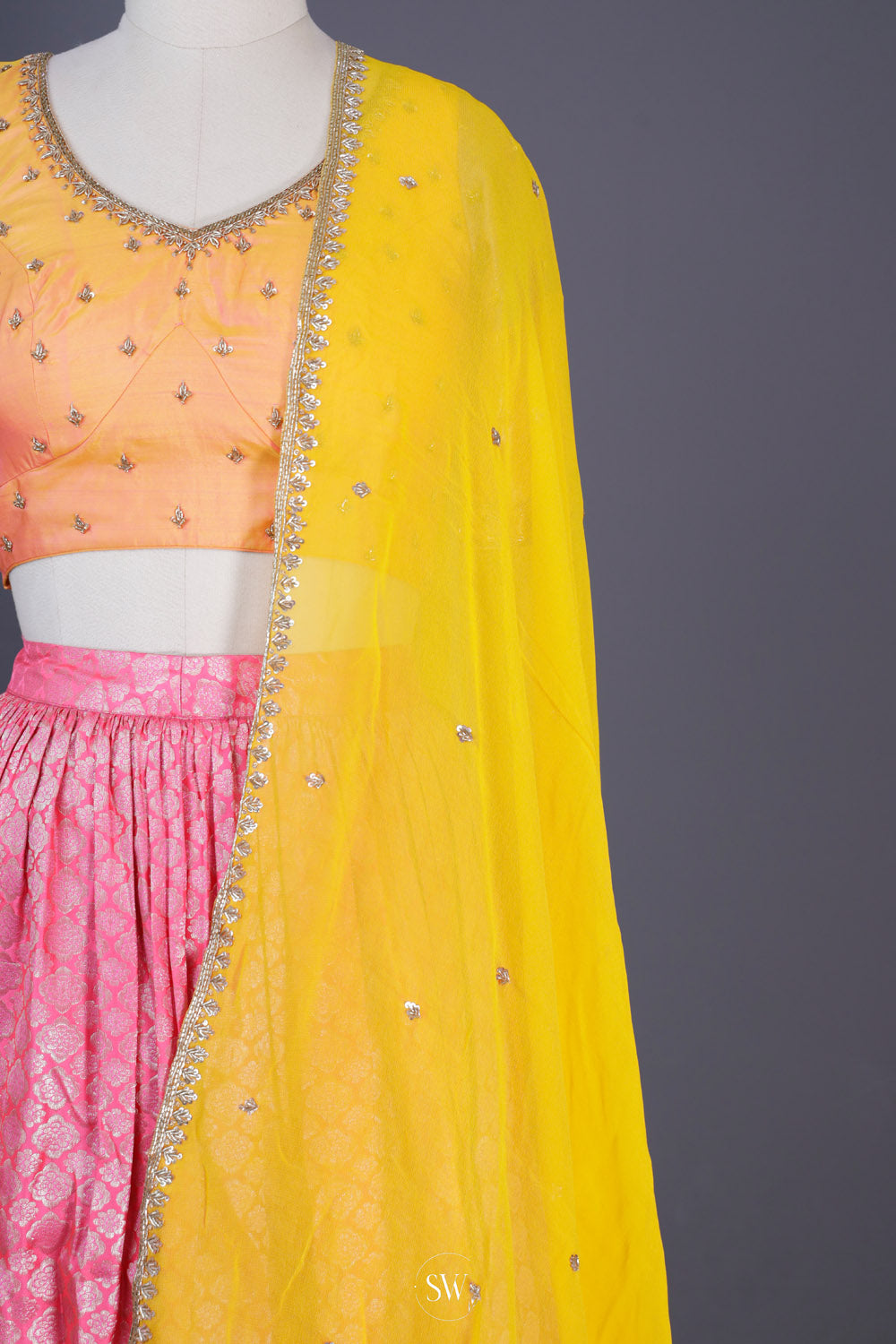 Saffron Yellow-Pink Silk Lehenga Set With Zari Weaving