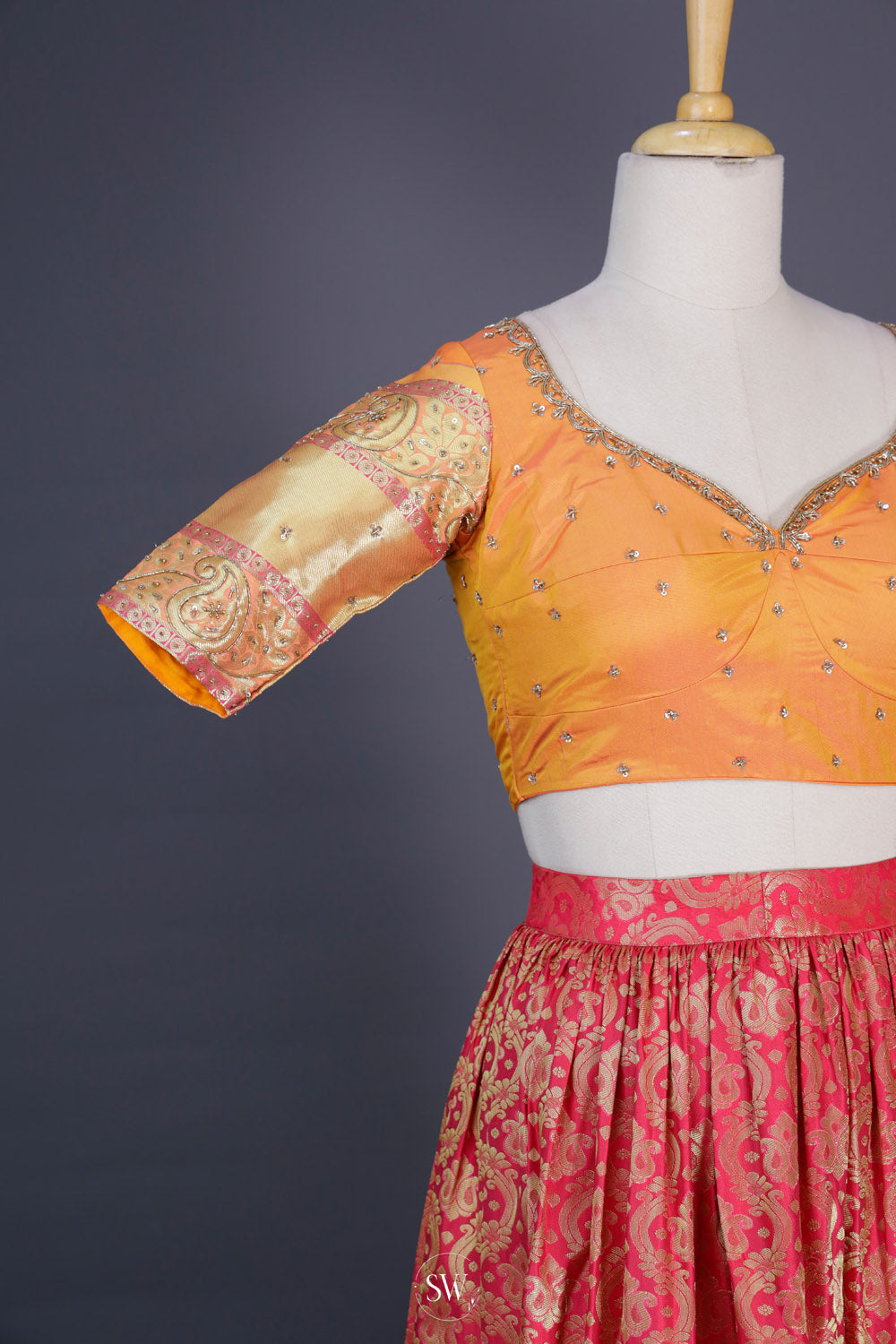 Desire Red-Saffron Orange Silk Lehenga Set With Zari Weaving
