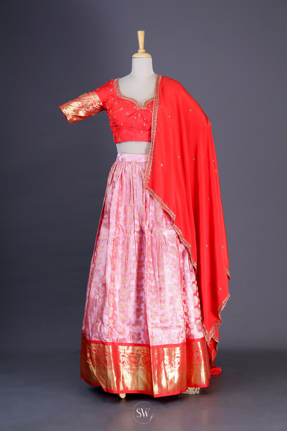 Deep Orange-Pink Silk Lehenga Set With Zari Weaving