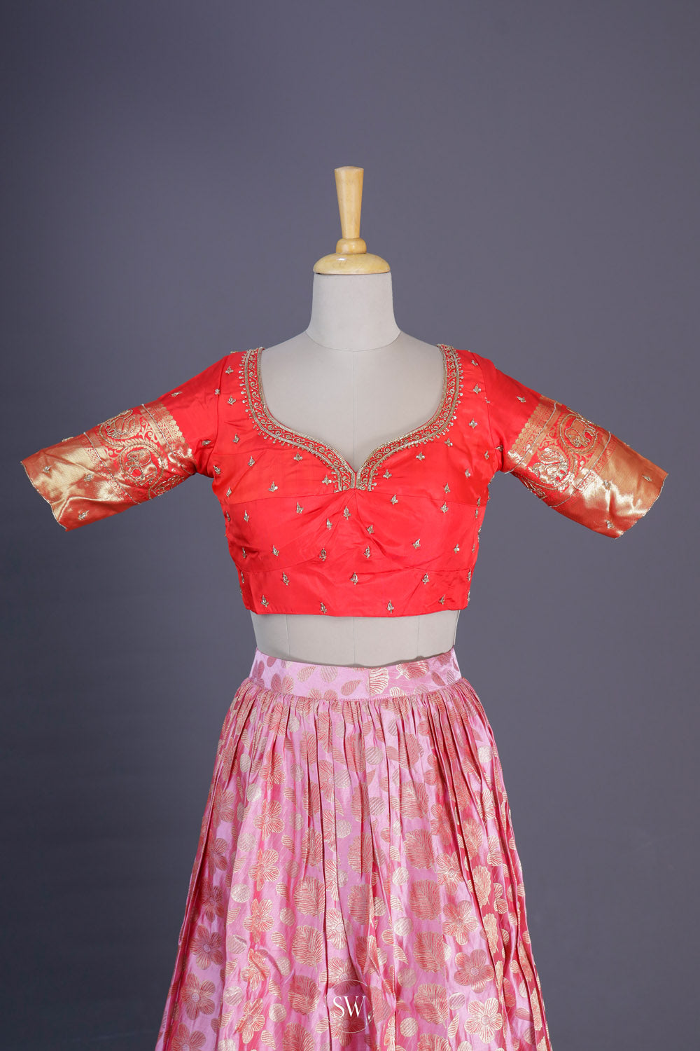 Deep Orange-Pink Silk Lehenga Set With Zari Weaving