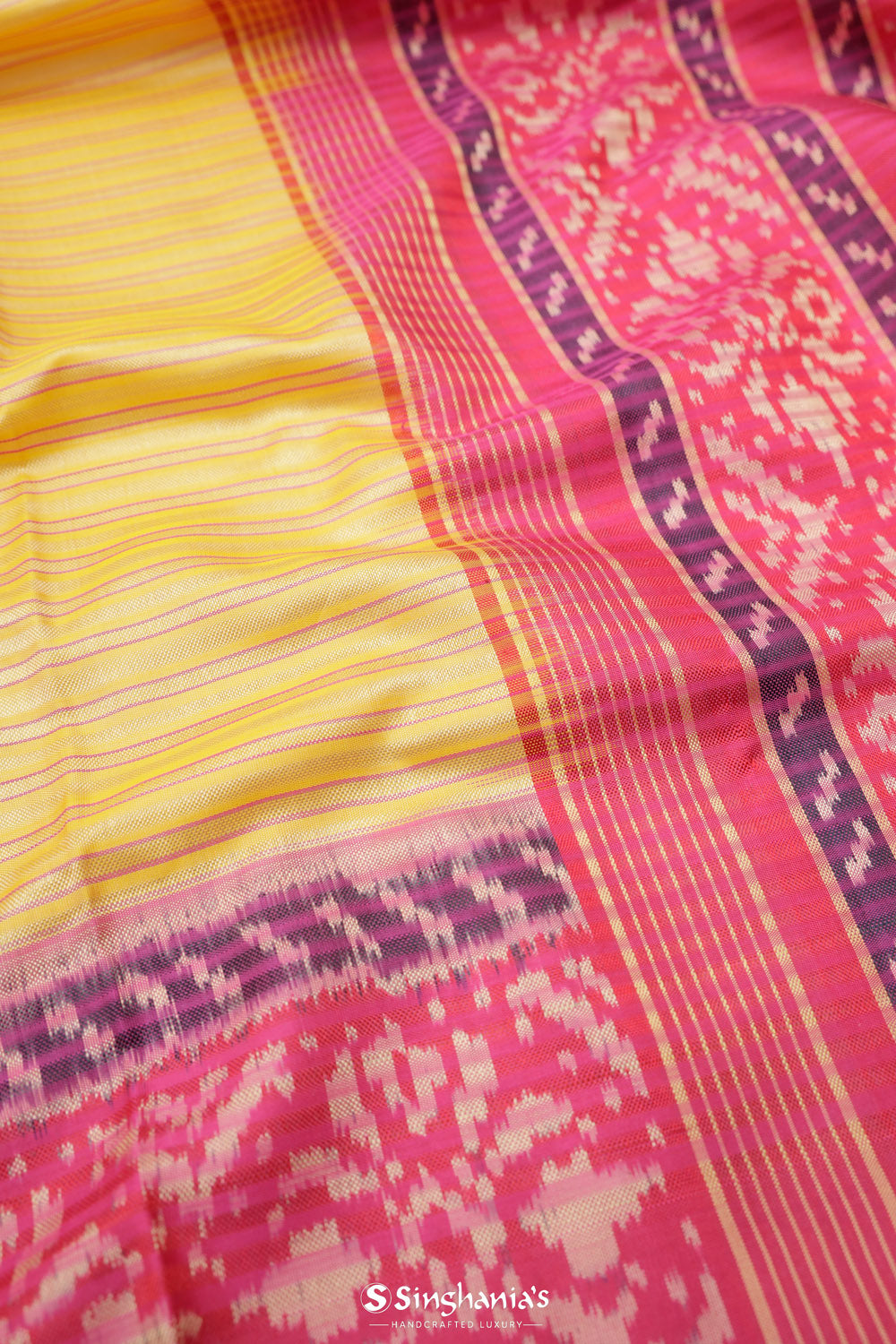 Macaroon Yellow Ikat Patola Silk Saree With Contrast Border