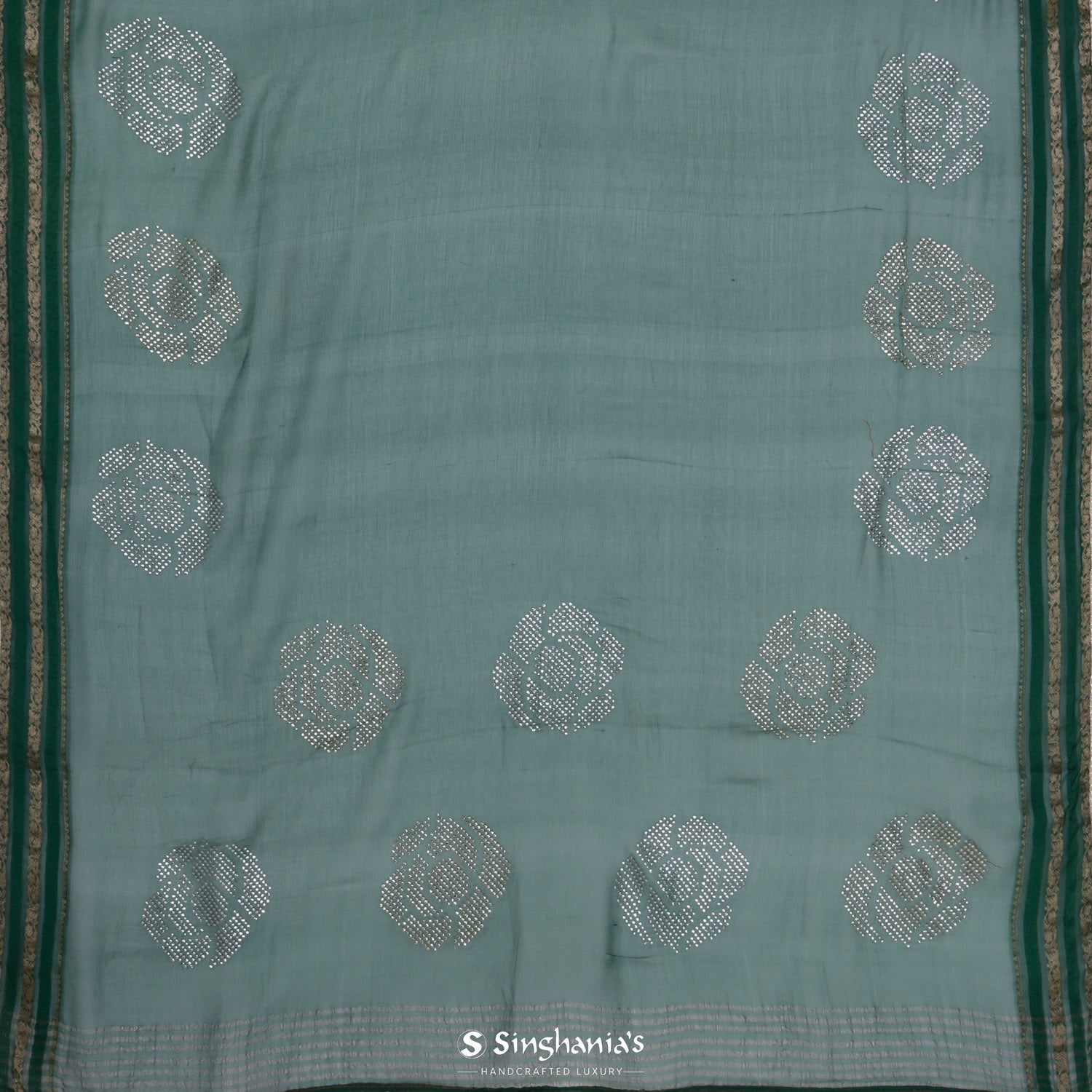 Sacramento Green Georgette Saree With Mukaish Work In Floral Buttas