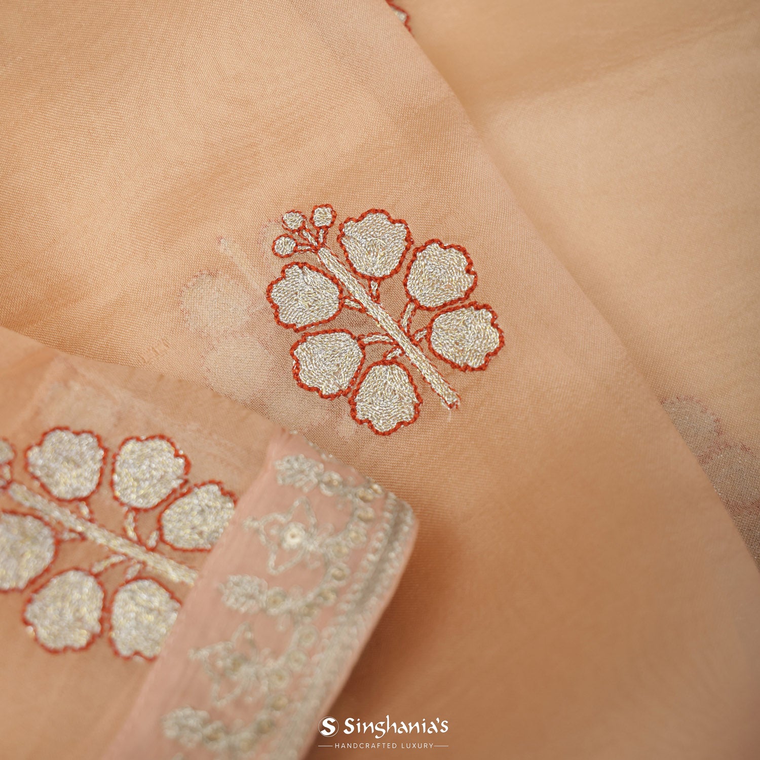 Baby Orange Organza Saree With Floral Thread Work Buttis