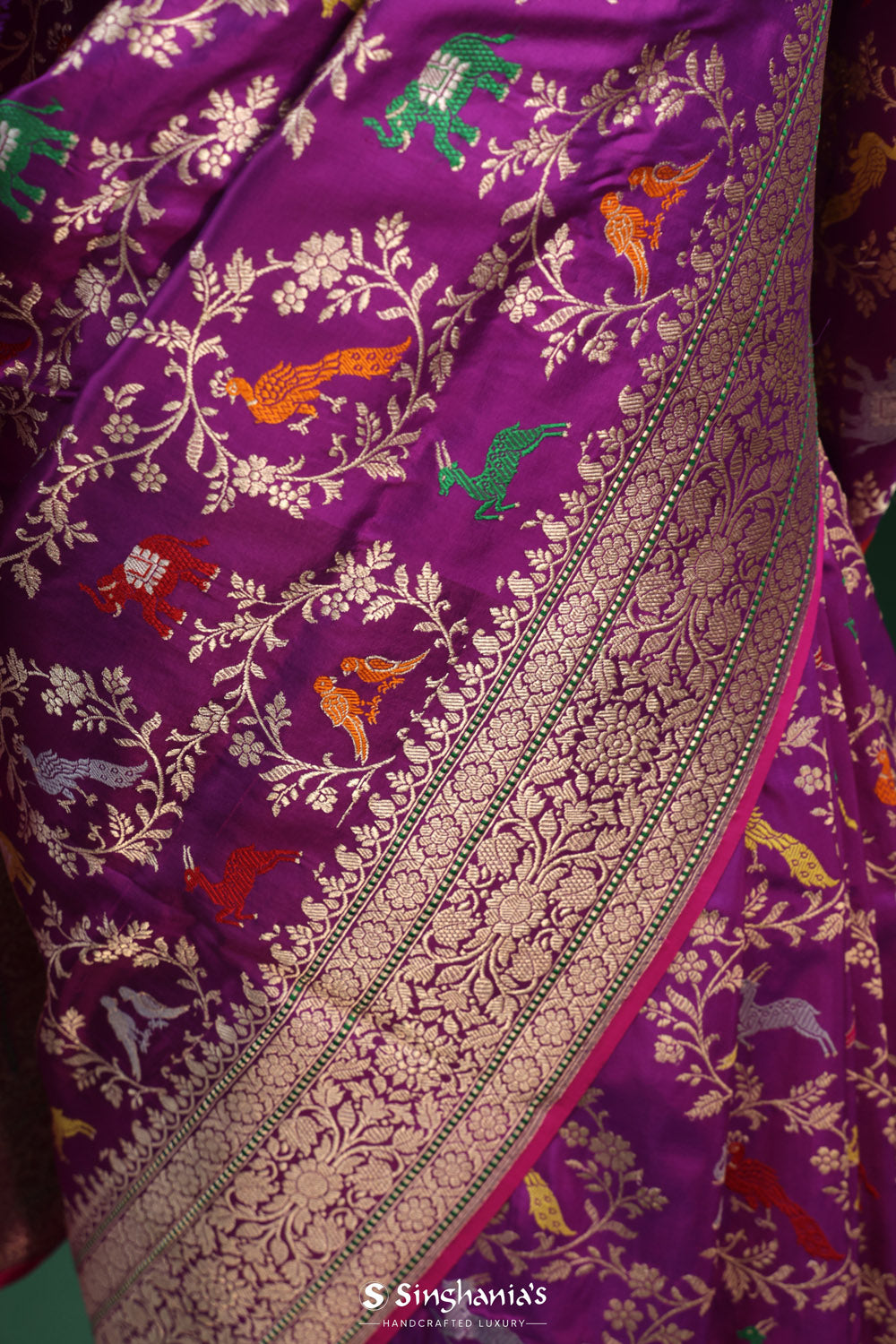 Dark Magenta Banarasi Silk Saree With Animal Motifs