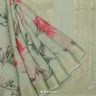 Tea Green Printed Linen Saree With Floral Pattern