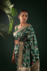 Dark Green Banarasi Silk Saree With Geometric And Floral Patterns