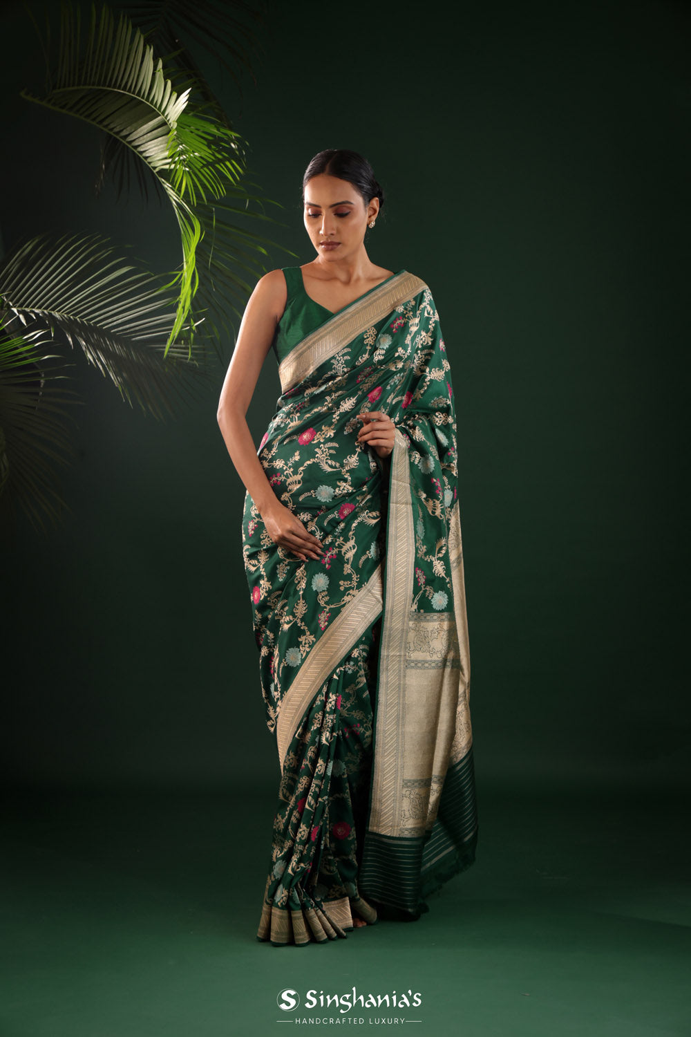 Dark Green Banarasi Silk Saree With Geometric And Floral Patterns