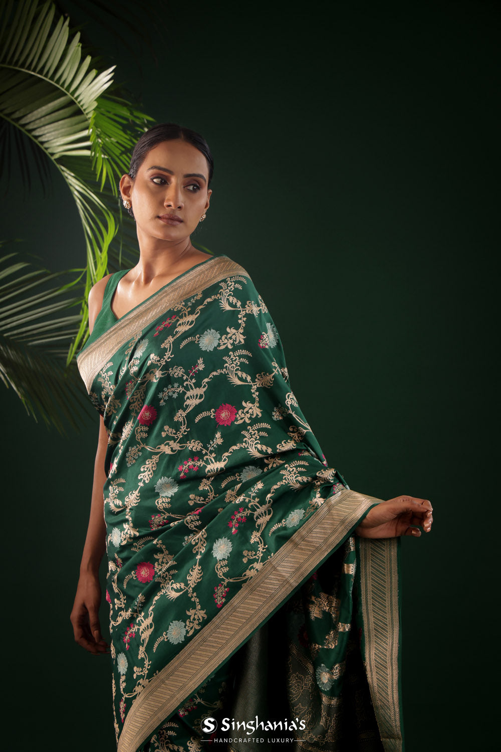 Dark Green Banarasi Silk Saree With Geometric And Floral Patterns