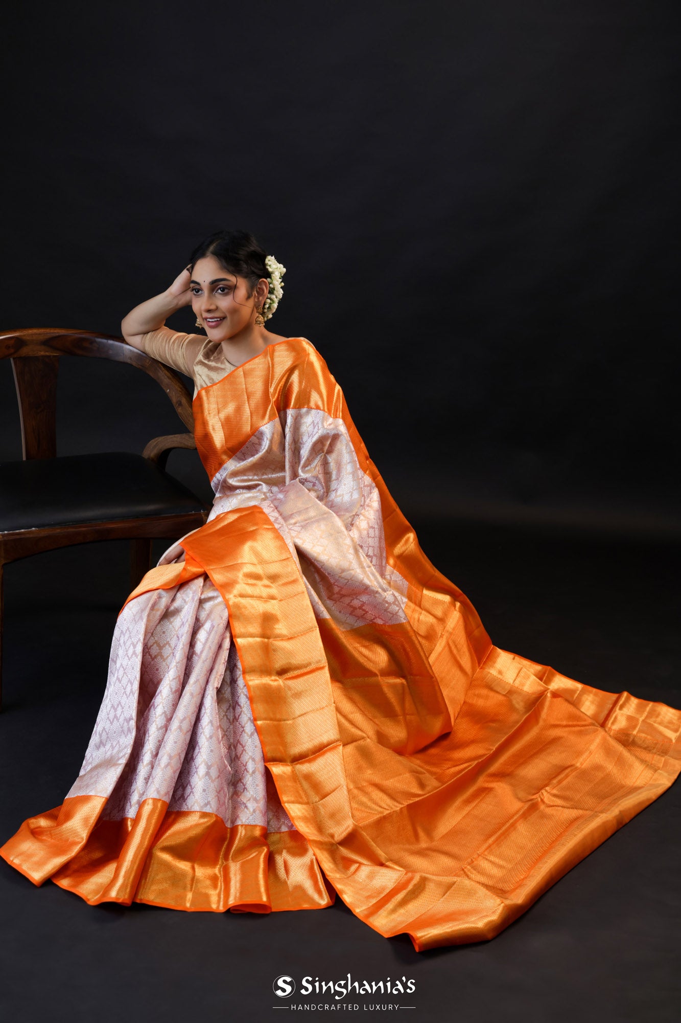 Pastel Peach Tissue Kanjivaram Silk Saree With Contrast Border