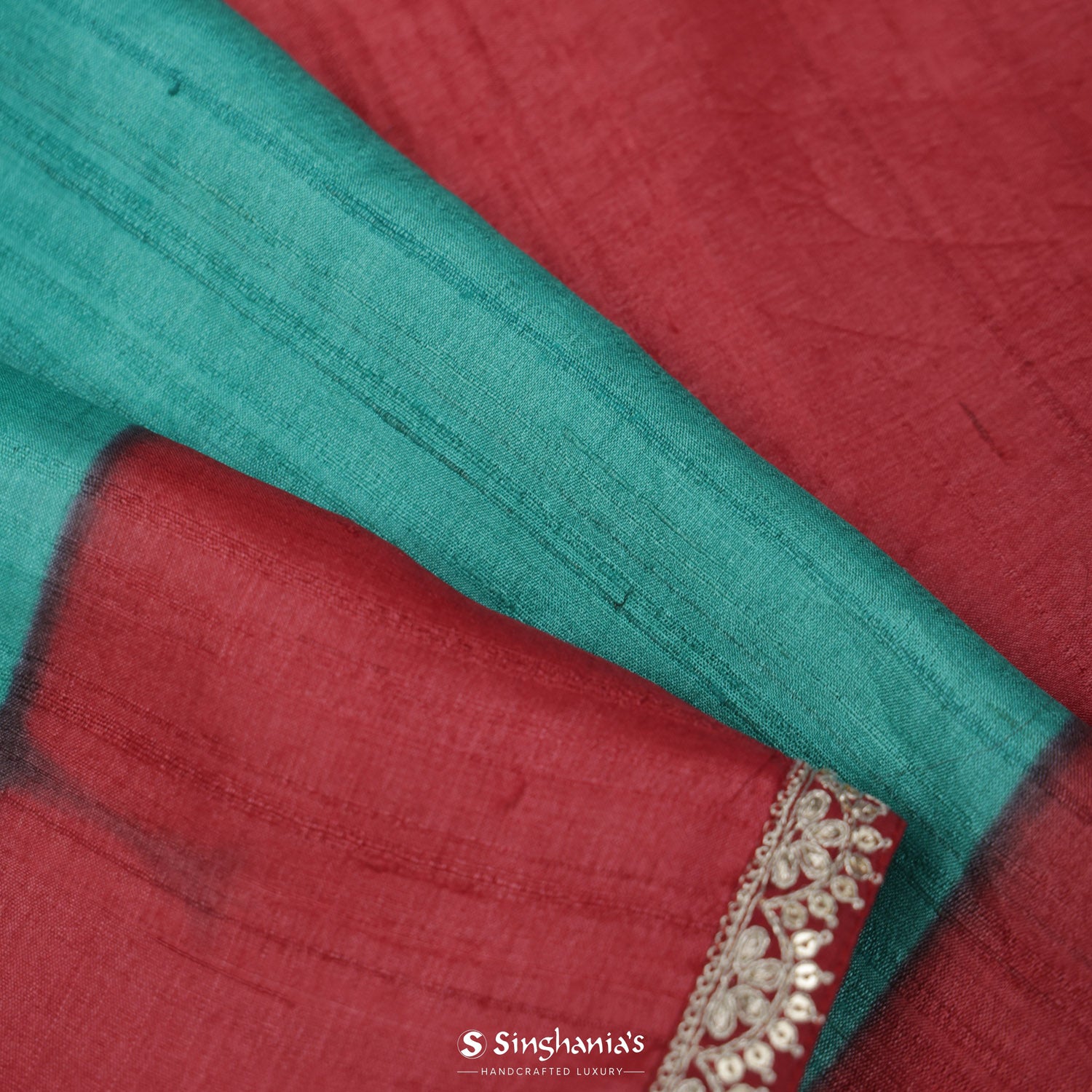 Fluorescent Blue Tussar Silk Saree With Contrast Red Border