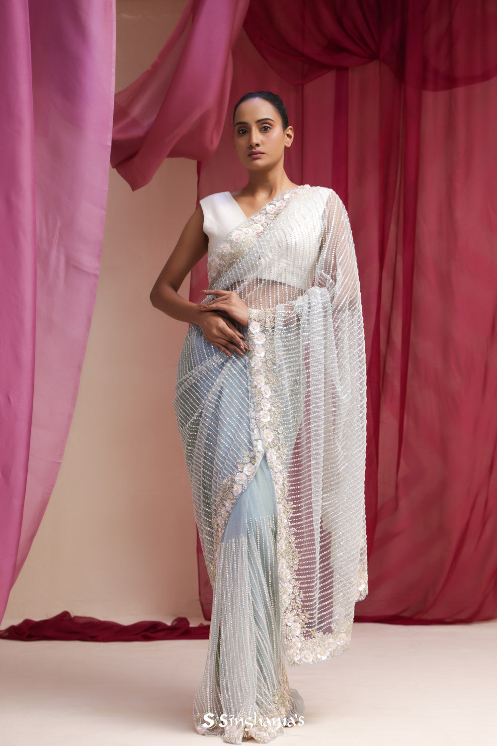 Ice Blue Net Designer Saree With Hand Embroidery