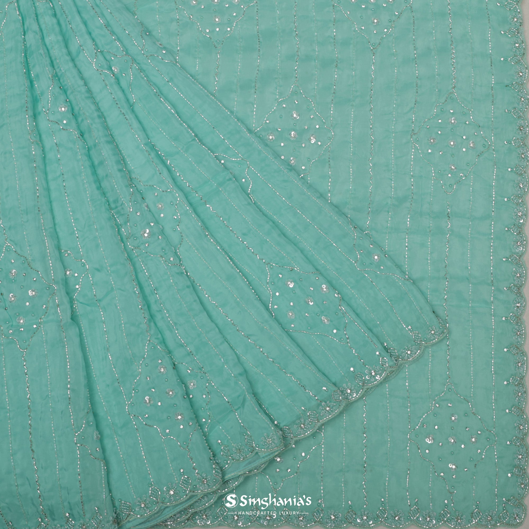 Medium Turquoise Blue Organza Saree With Hand Embroidery