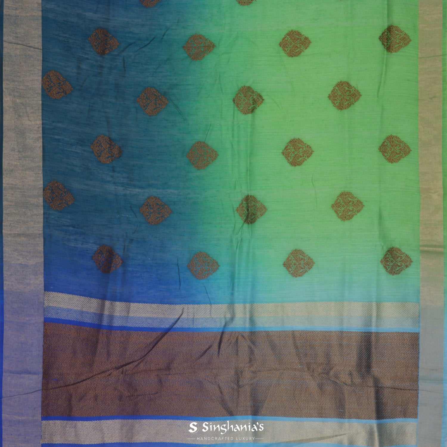 Bluish Green Printed Matka Saree With Floral Weaving