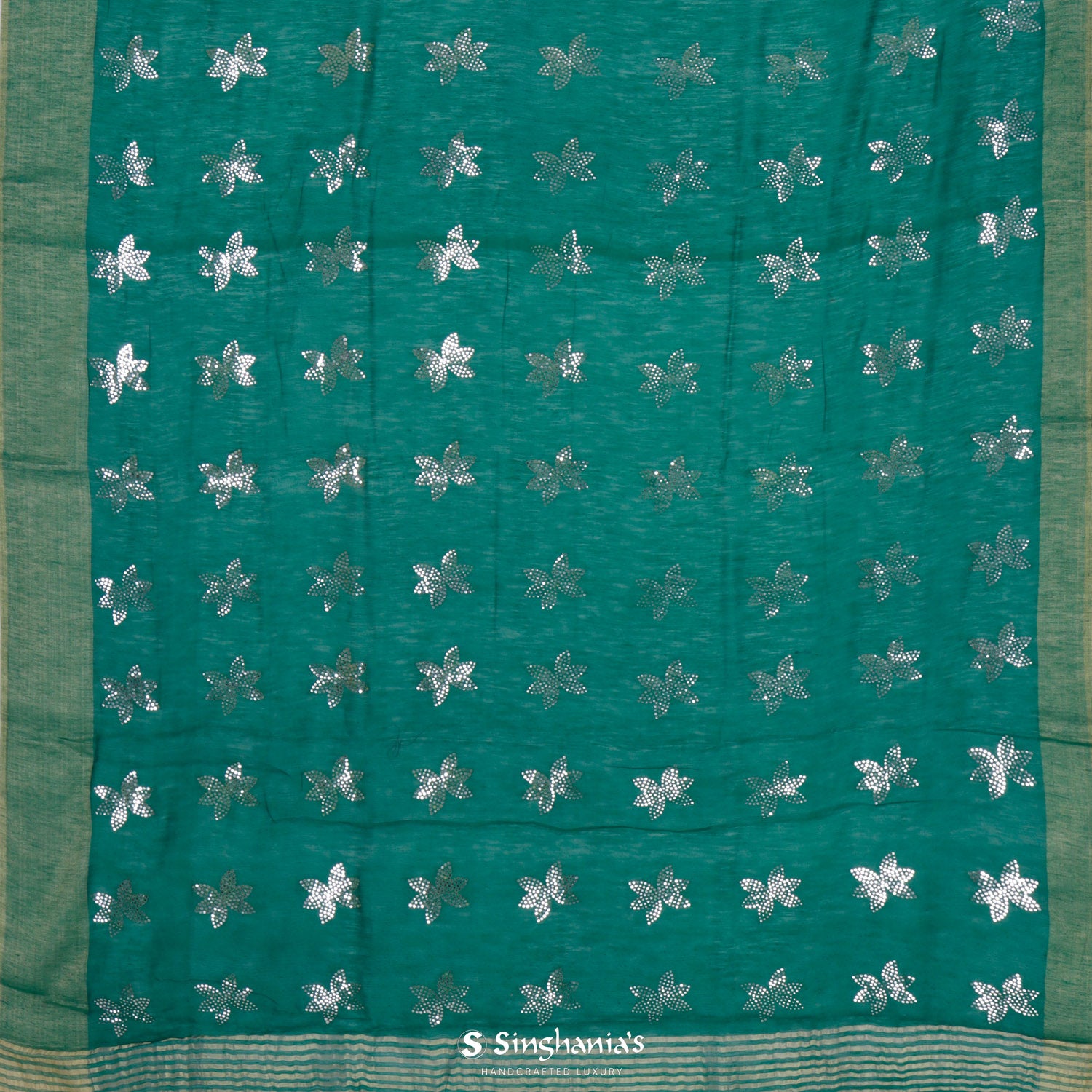 Pine Green Linen Saree With Mukaish Work In Floral Buttis