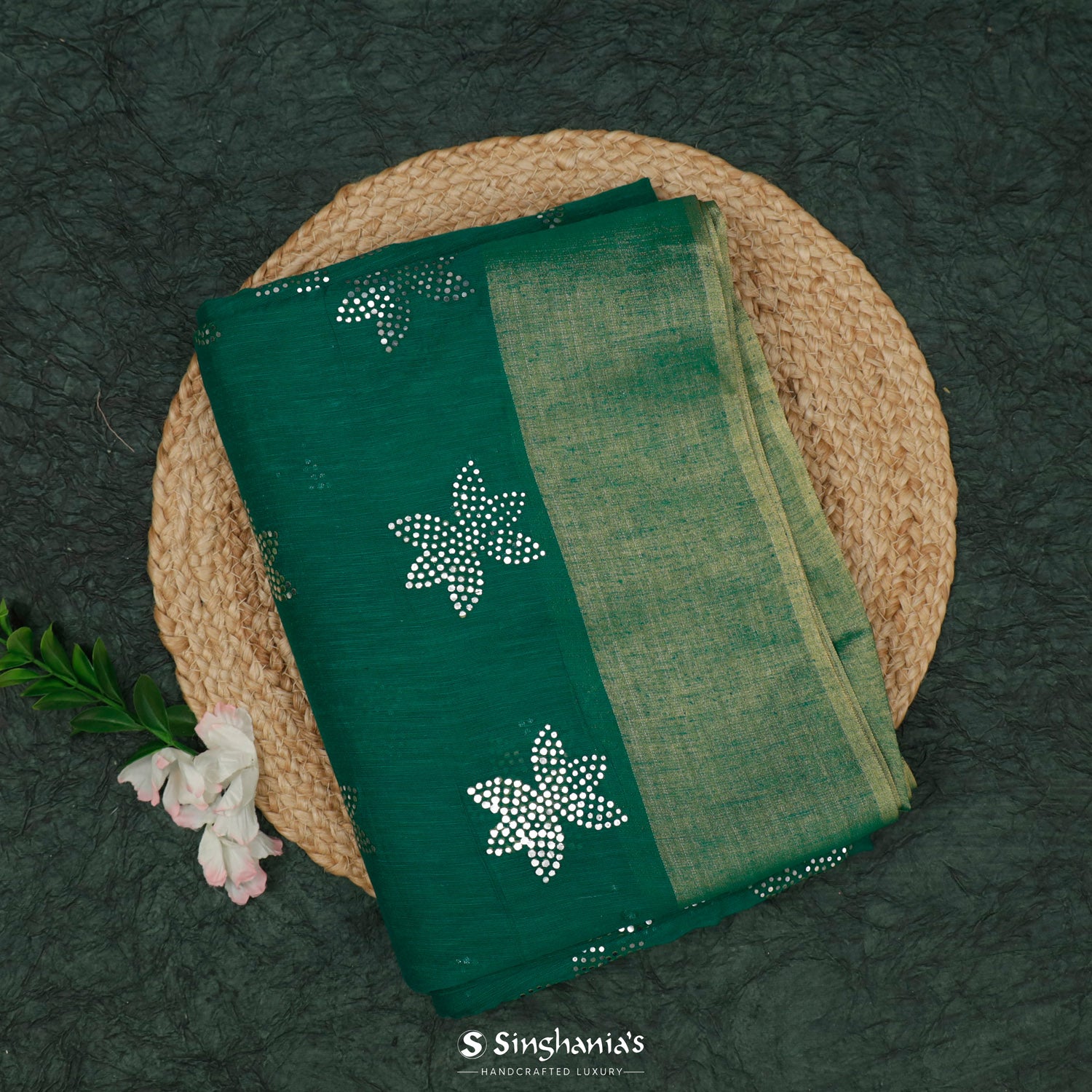 Pine Green Linen Saree With Mukaish Work In Floral Buttis