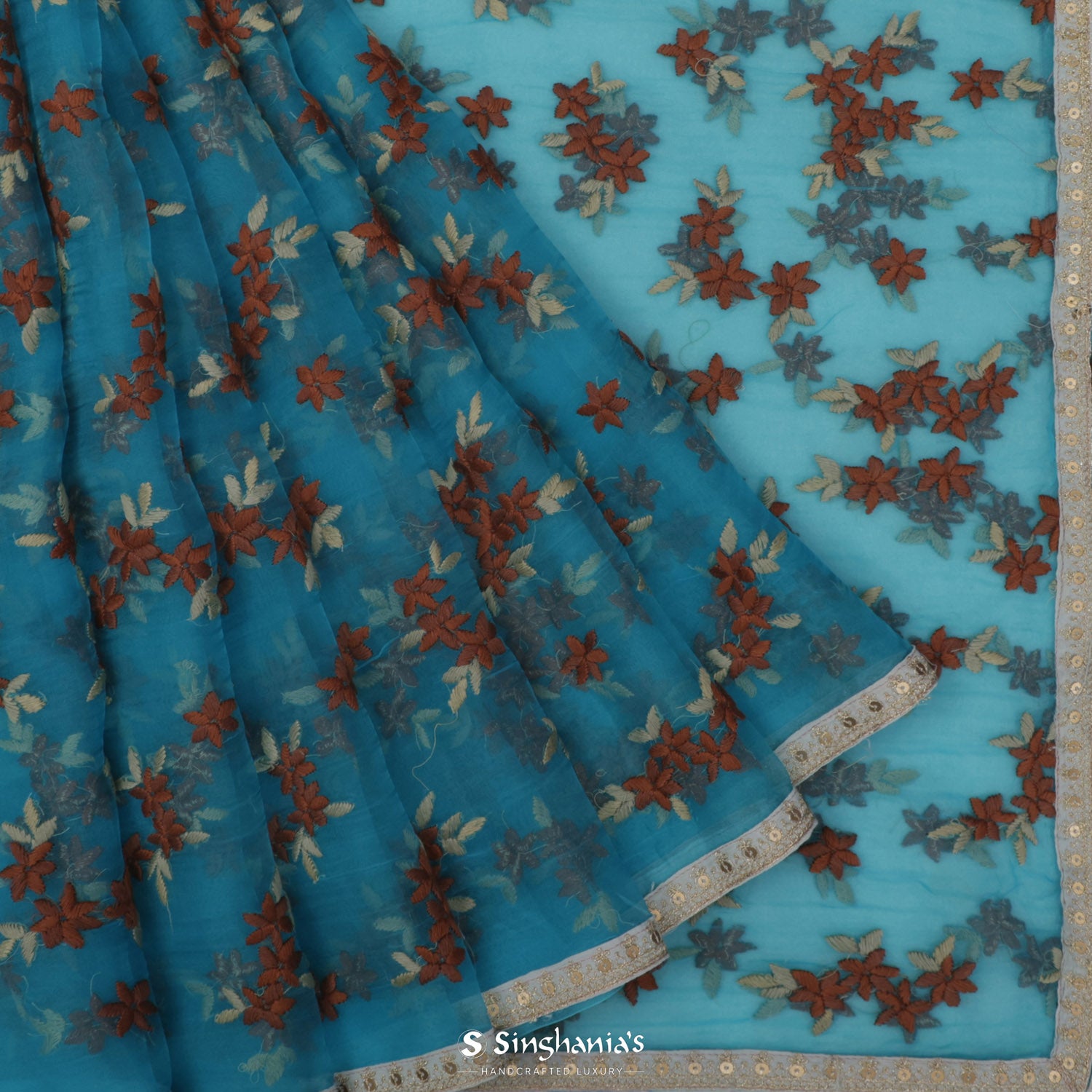 Ocean Blue Printed Organza Saree With Floral Pattern