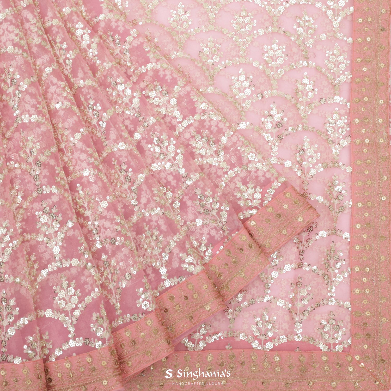 Shimmering Blush Pink Organza Saree With Hand Embroidery