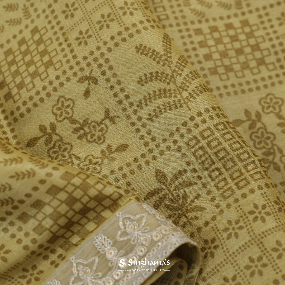 Camouflage Yellow Tussar Silk Saree With Printed Floral-Leaves Pattern