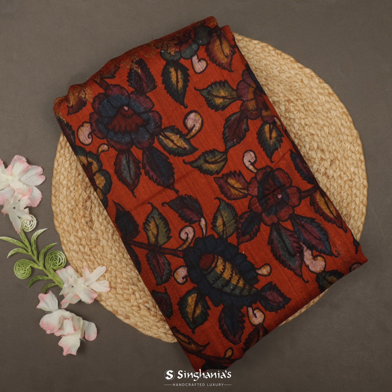 Alloy Orange Printed Matka Silk Saree With Floral Pattern Has Big Border