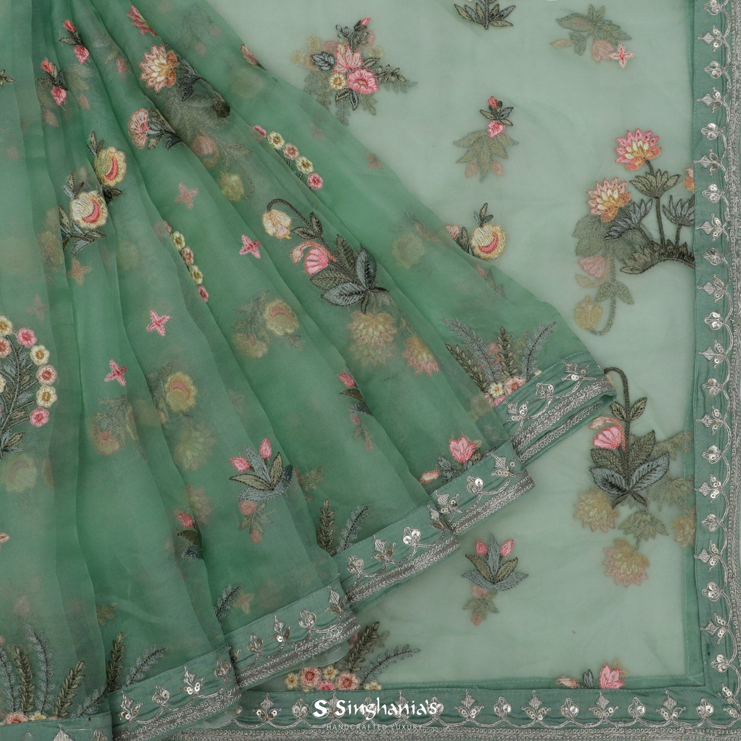 Celadon Green Organza Saree With Floral Pattern