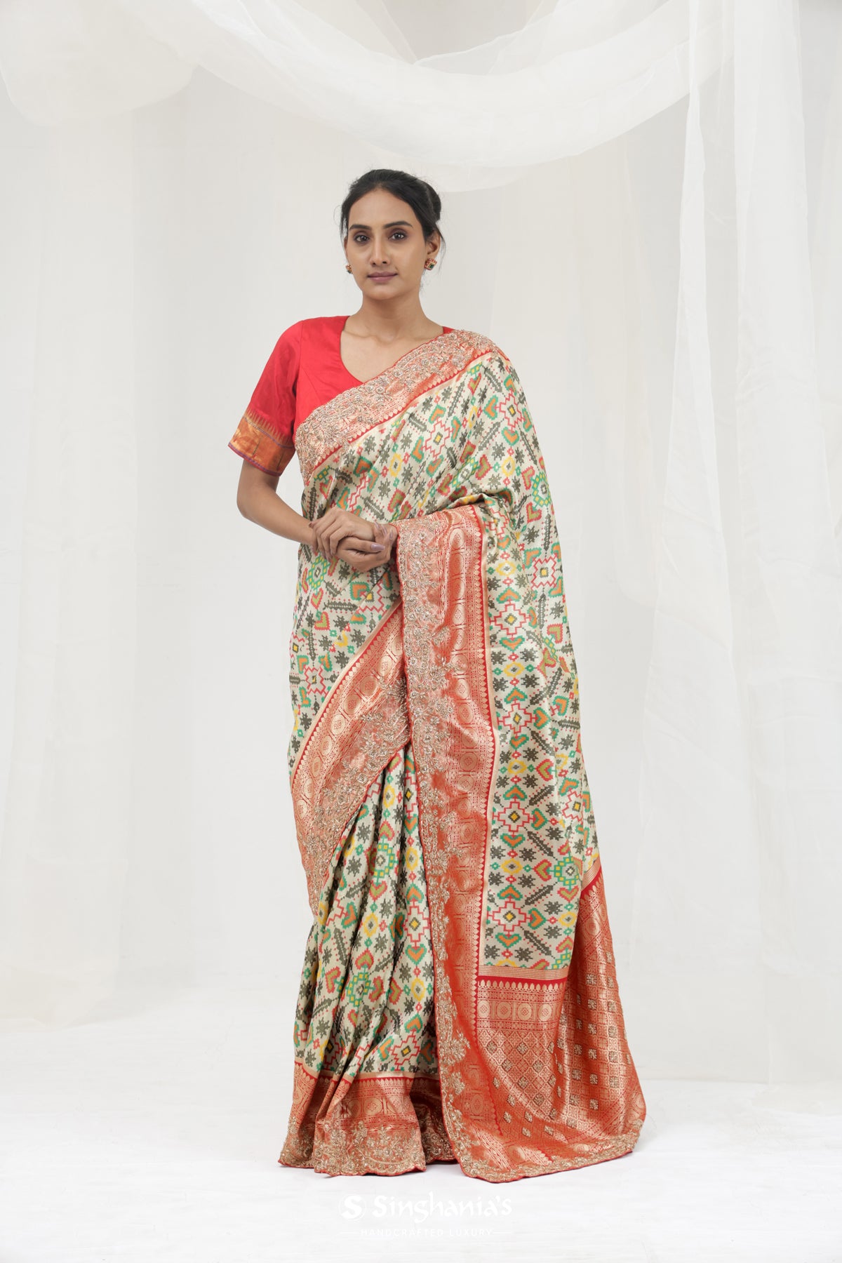 Pale Pista Green Kanjivaram Silk Saree With Ikat Patola Weaving