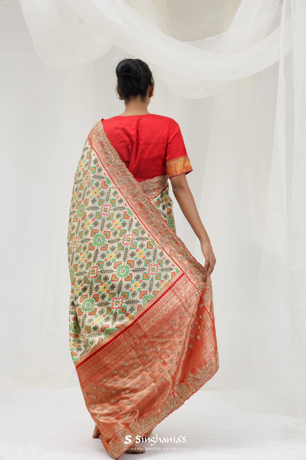 Pale Pista Green Kanjivaram Silk Saree With Ikat Patola Weaving