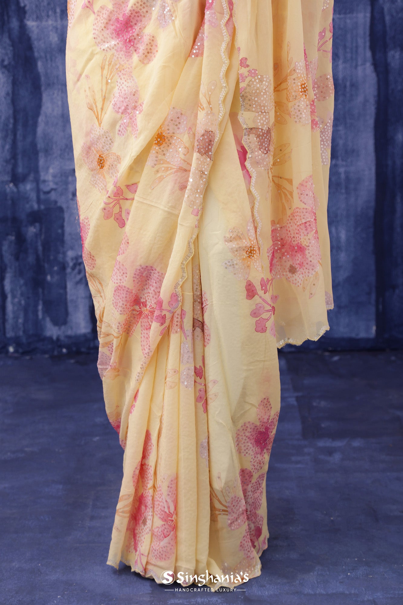 Light Saffron Yellow Printed Georgette Saree With Hand Embroidery