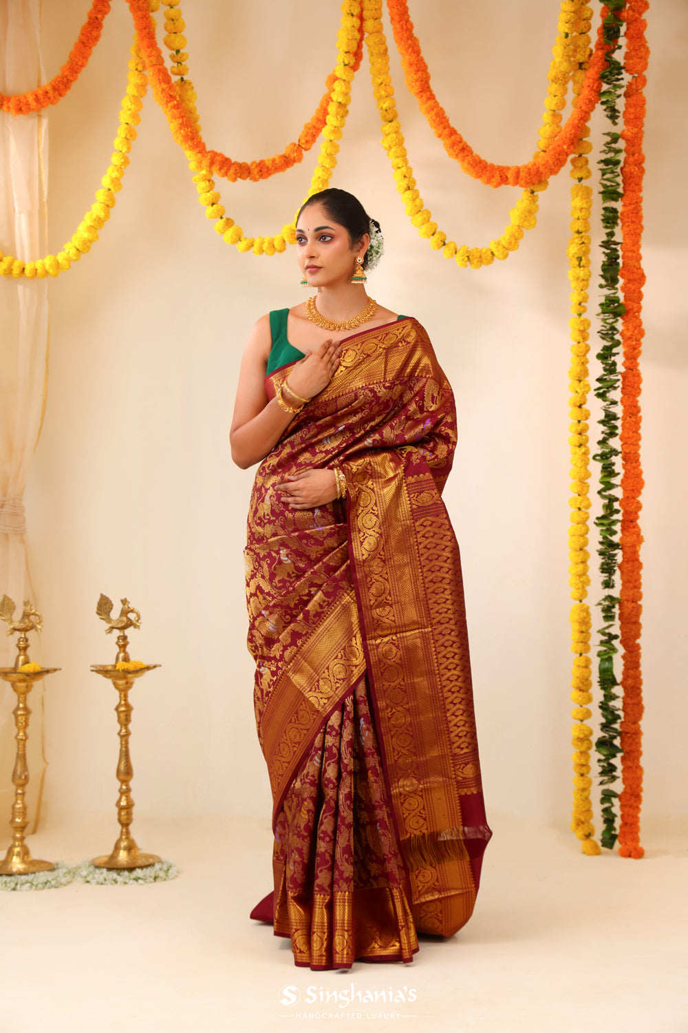 Deep Maroon Kanjivaram Silk Saree With Floral Fauna Weaving