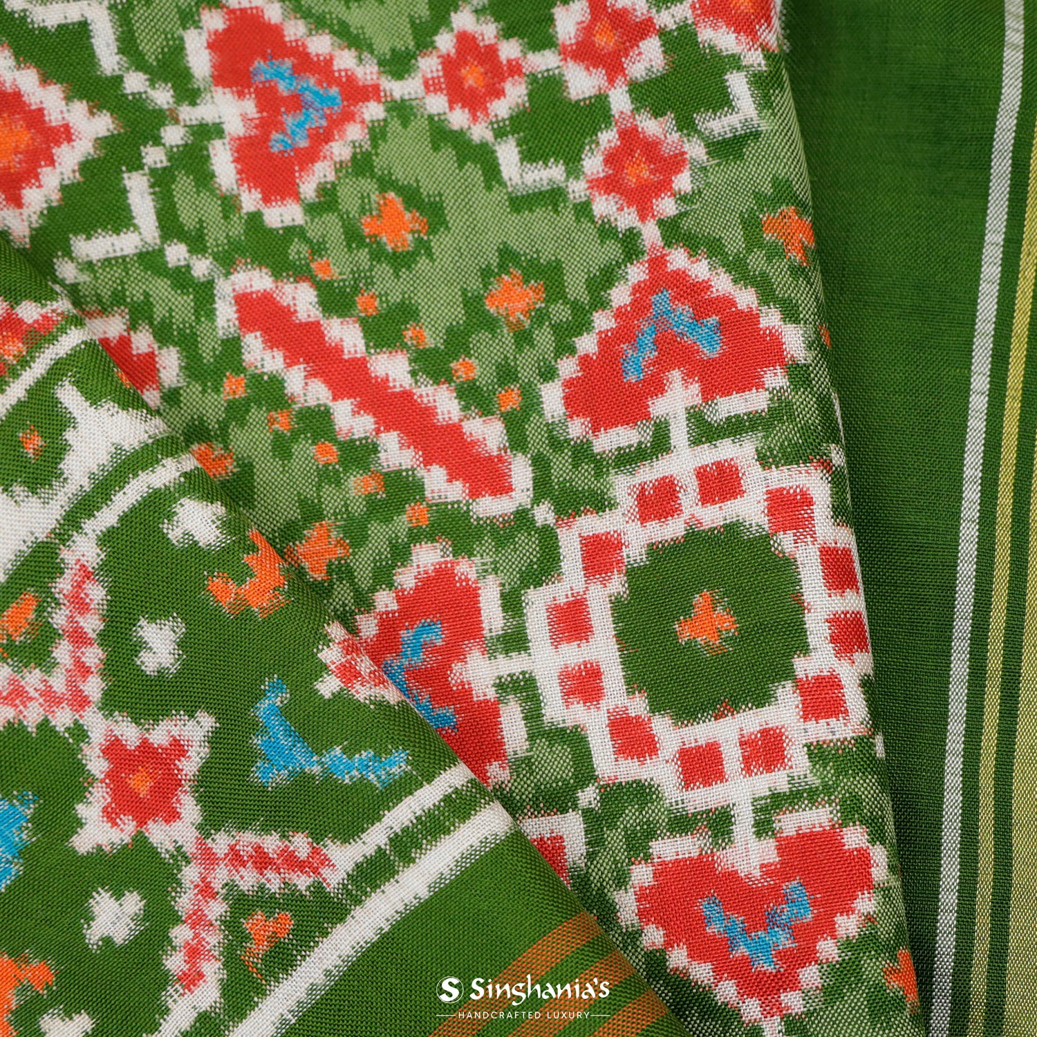 Sap Green Patola Silk Saree With Floral Fauna Pattern