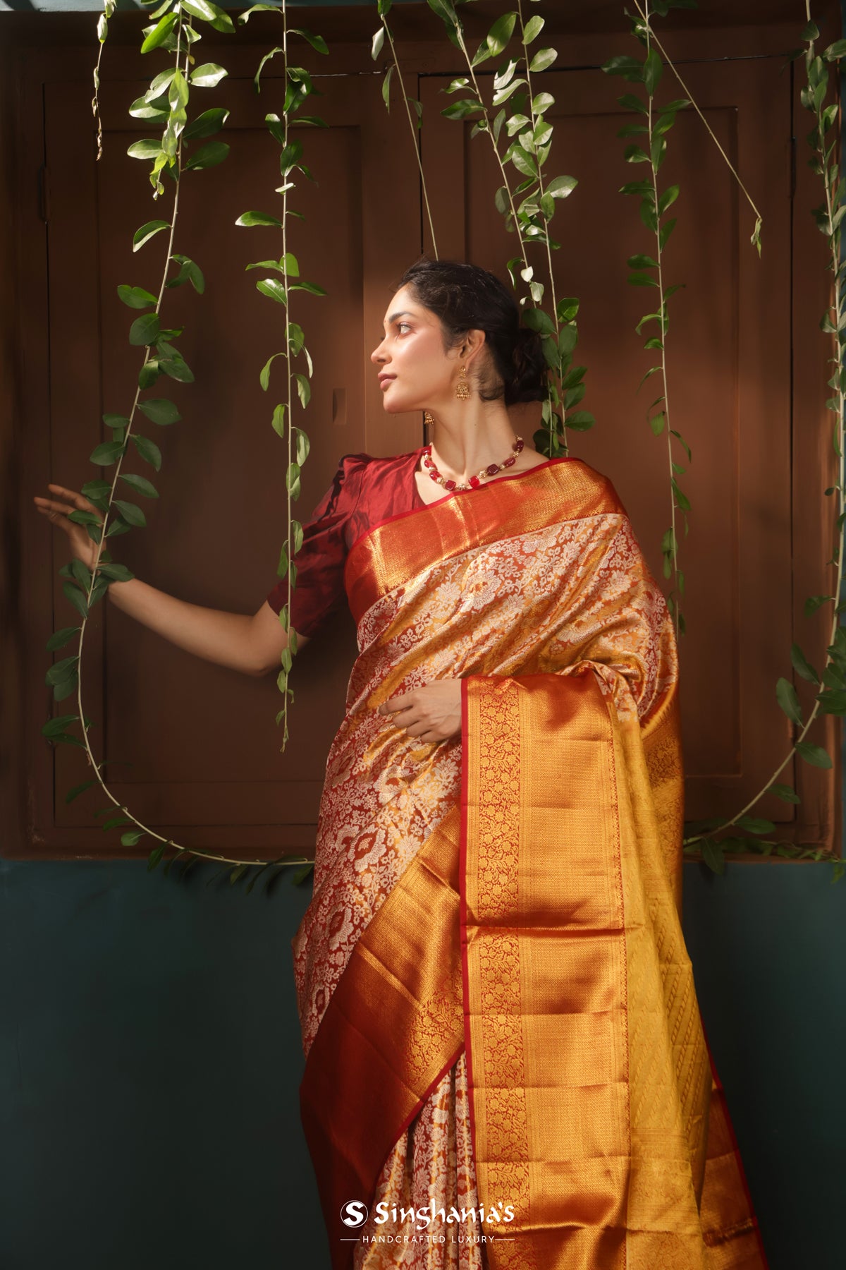 Dark Orange Kanjivaram Silk Saree With Floral Jaal Weaving