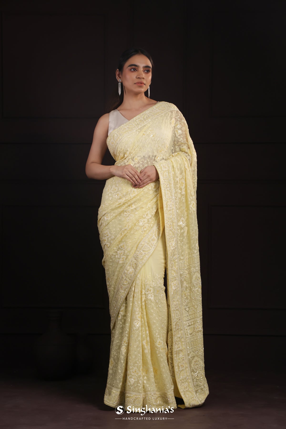 Light Khaki Yellow Georgette Saree With Hand Embroidery