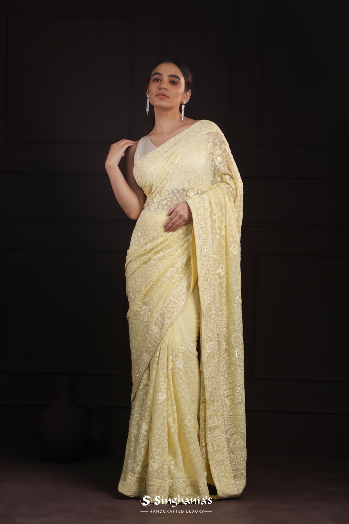 Light Khaki Yellow Georgette Saree With Hand Embroidery