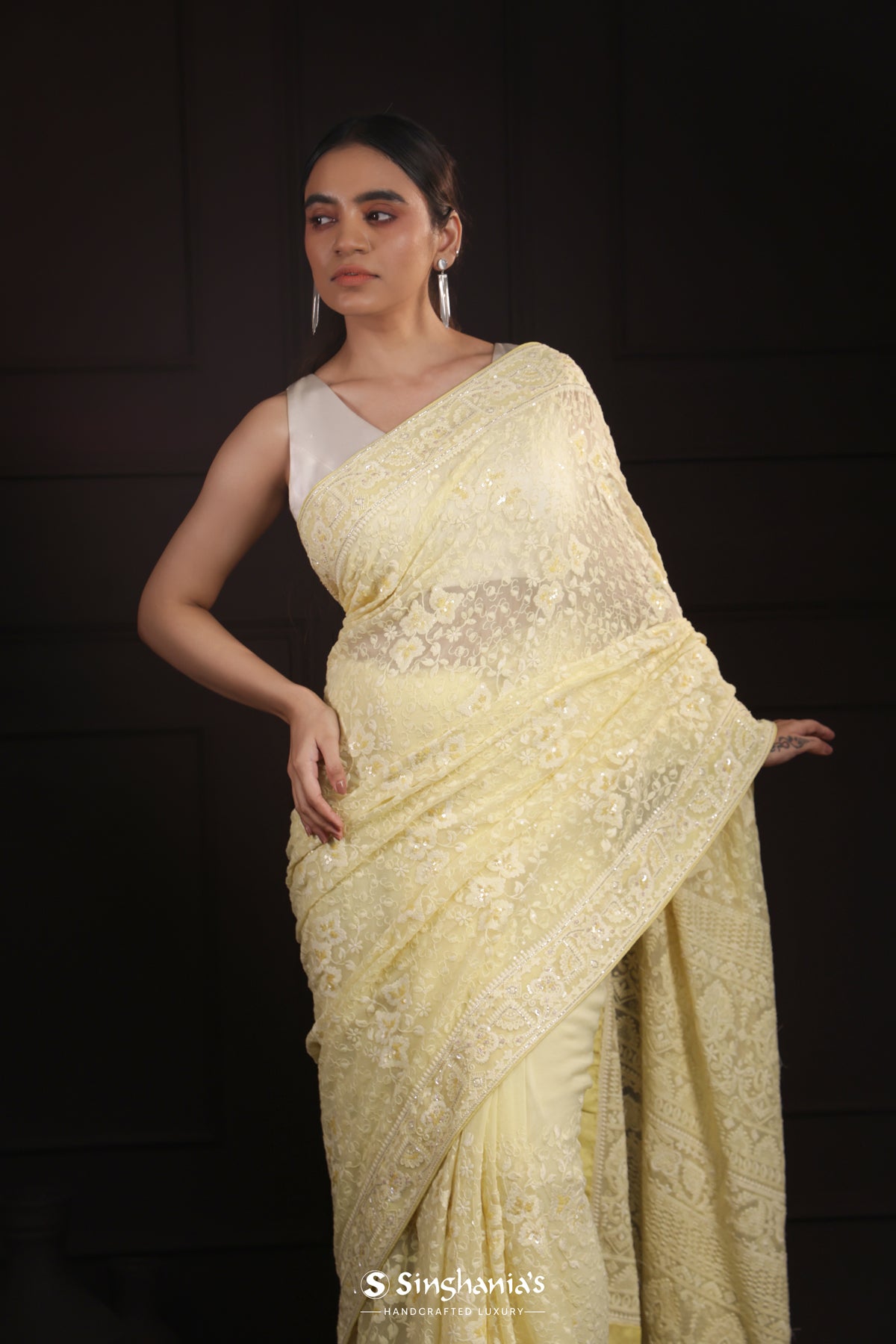 Light Khaki Yellow Georgette Saree With Hand Embroidery