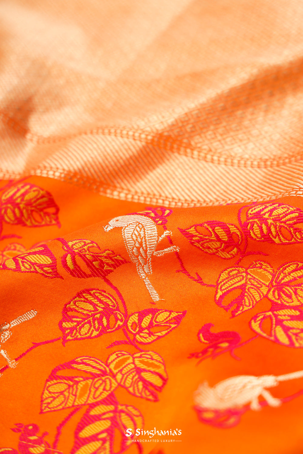 Vivid Orange Banarasi Satin Saree With Floral-Fauna Elegance