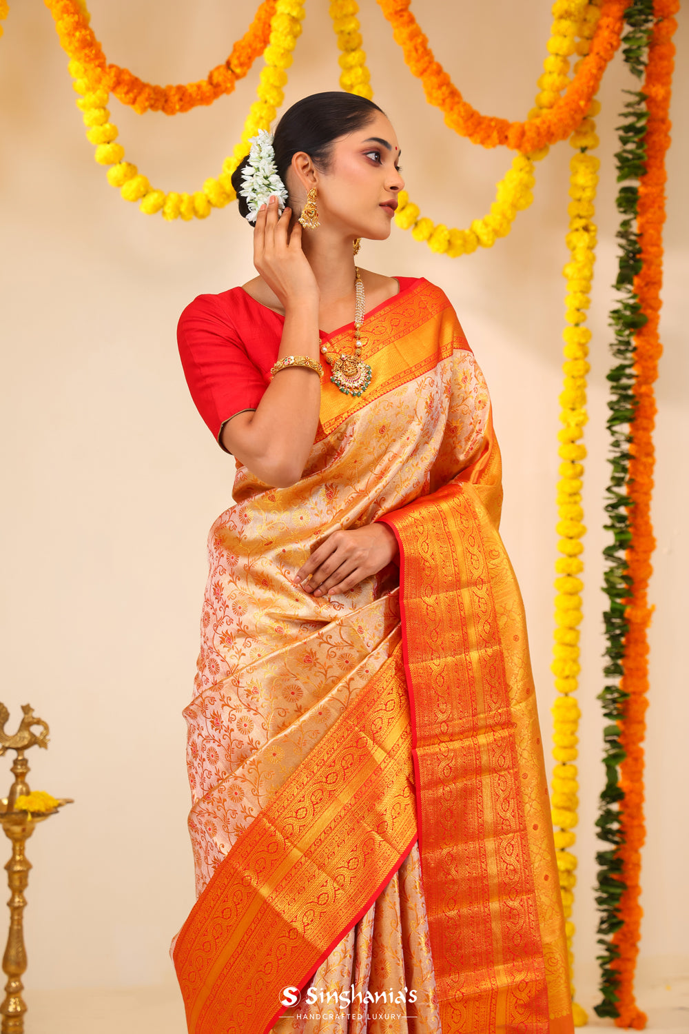 Pastel Peach-Gold Tissue Kanjivaram Saree With Floral Weaving