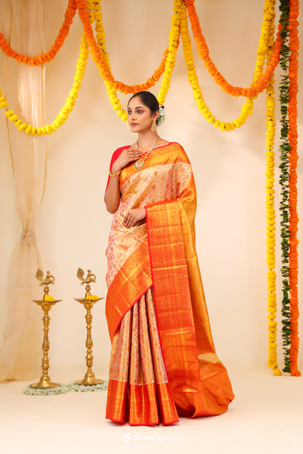 Pastel Peach-Gold Tissue Kanjivaram Saree With Floral Weaving