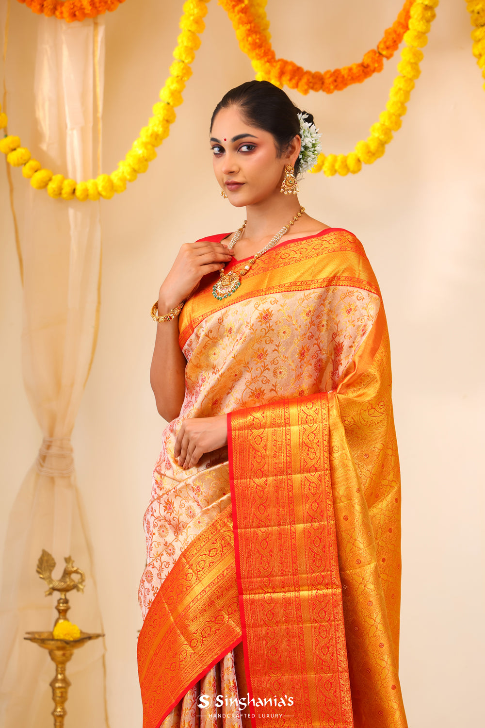 Pastel Peach-Gold Tissue Kanjivaram Saree With Floral Weaving