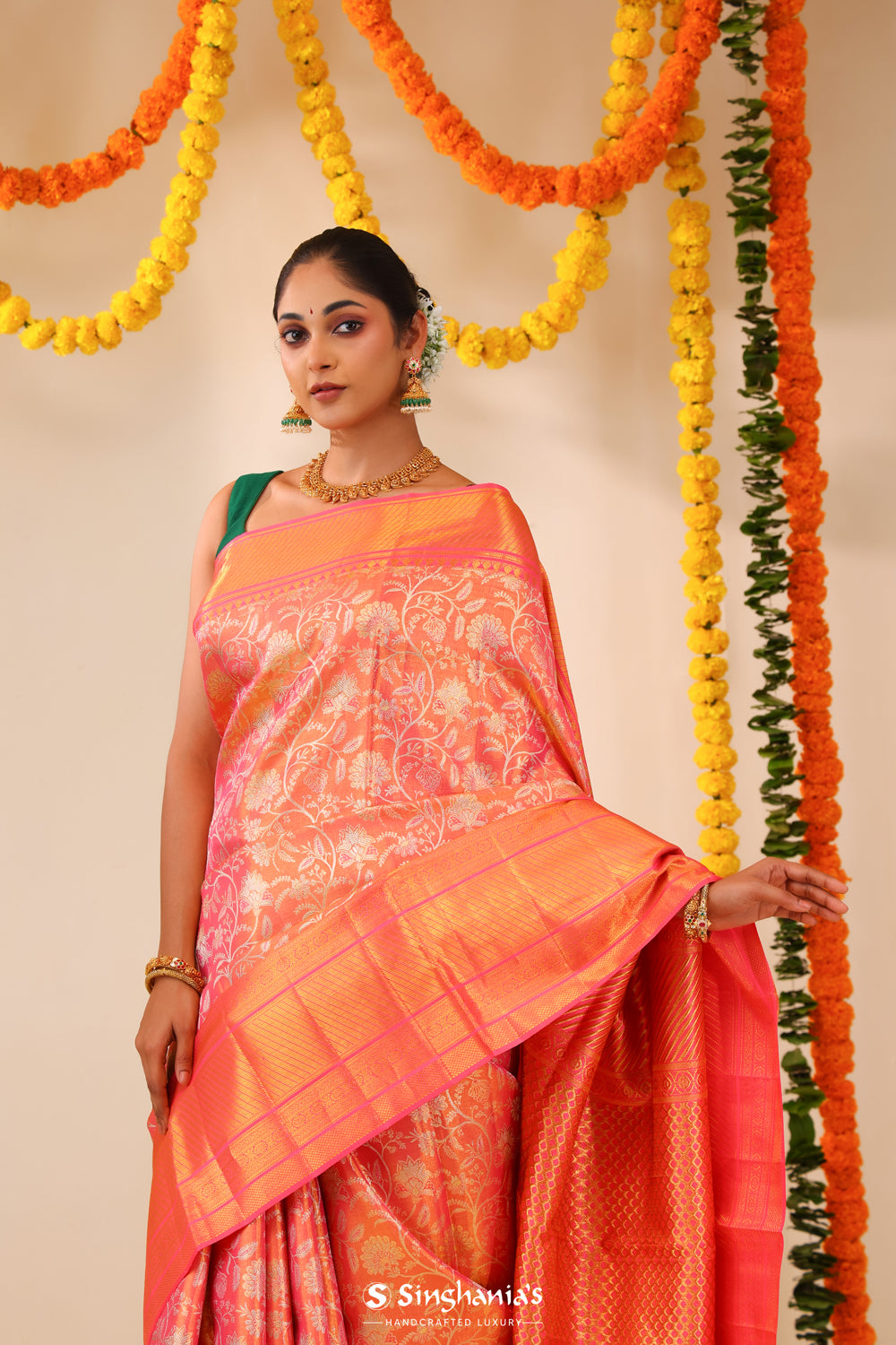 Melon Peach Tissue Kanjivaram Saree With Floral Weaving