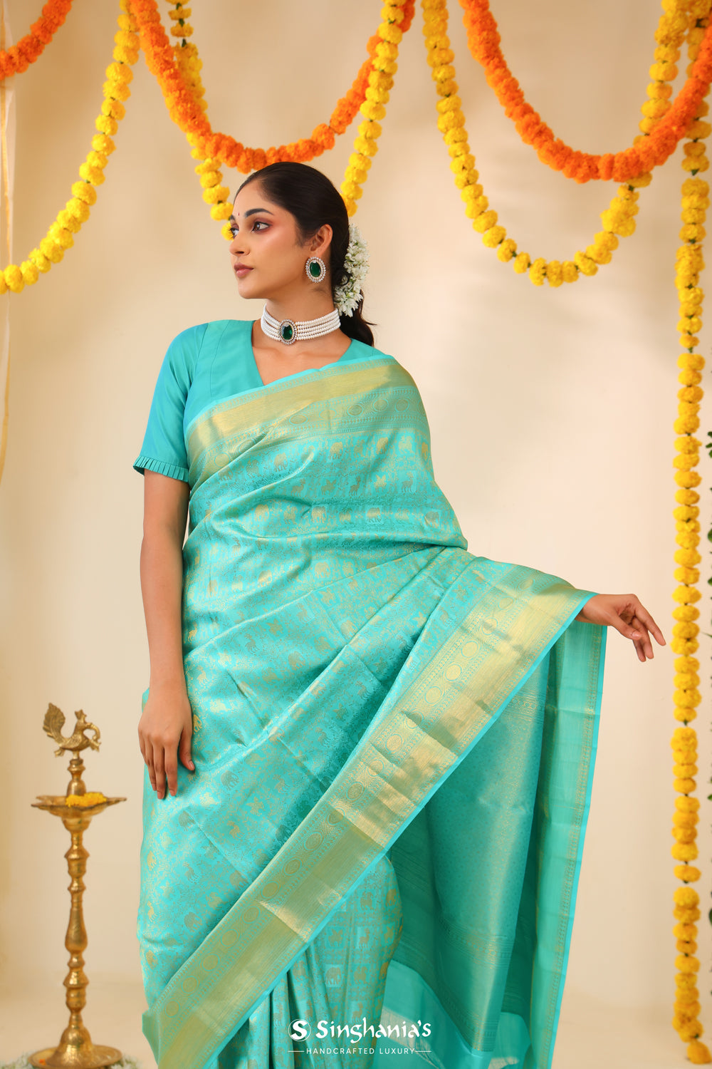 Aqua Blue Kanjivaram Silk Saree With Floral-Fauna Weaving