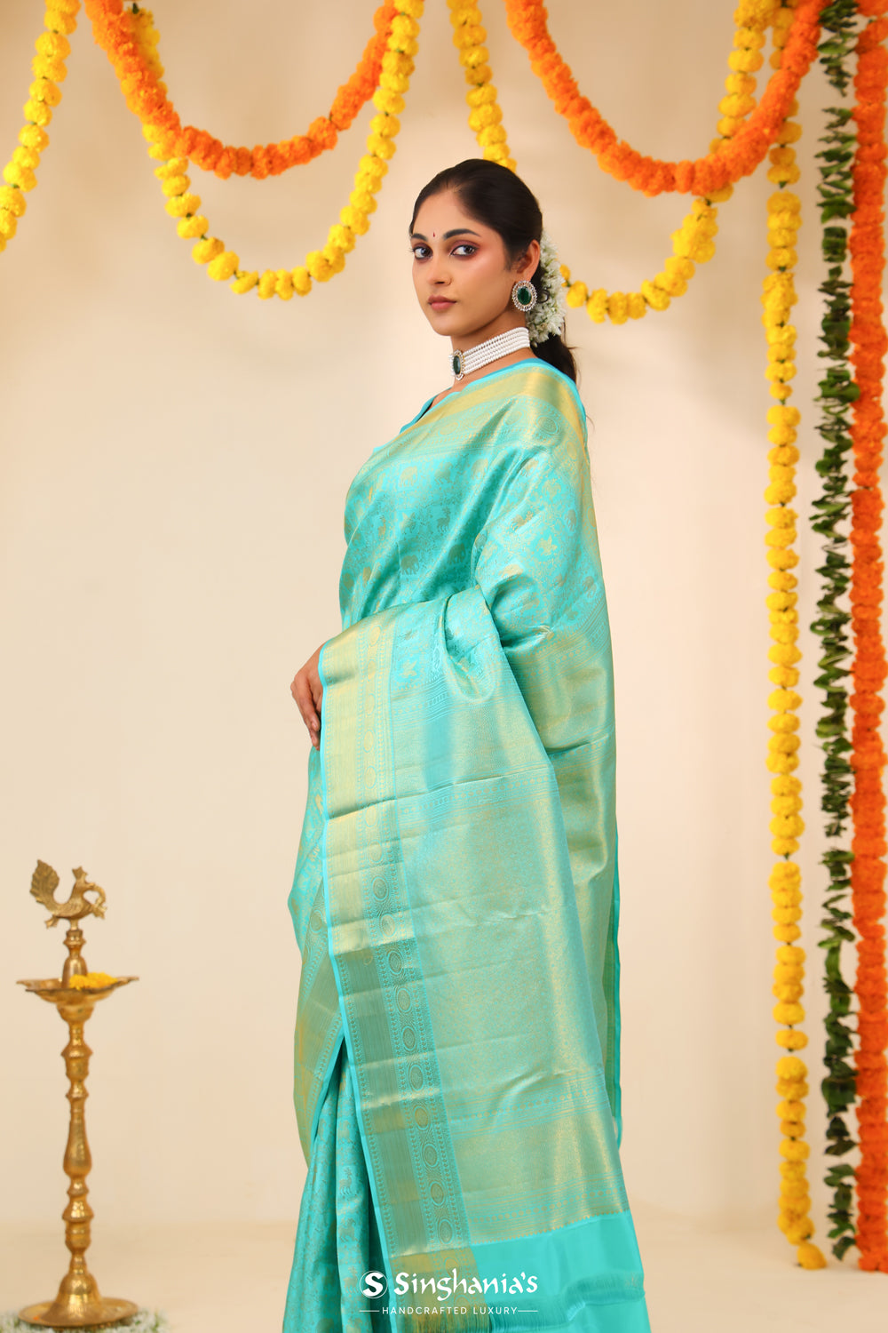 Aqua Blue Kanjivaram Silk Saree With Floral-Fauna Weaving