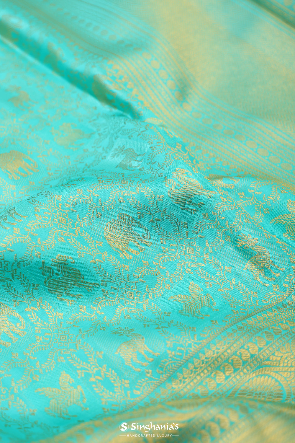 Aqua Blue Kanjivaram Silk Saree With Floral-Fauna Weaving