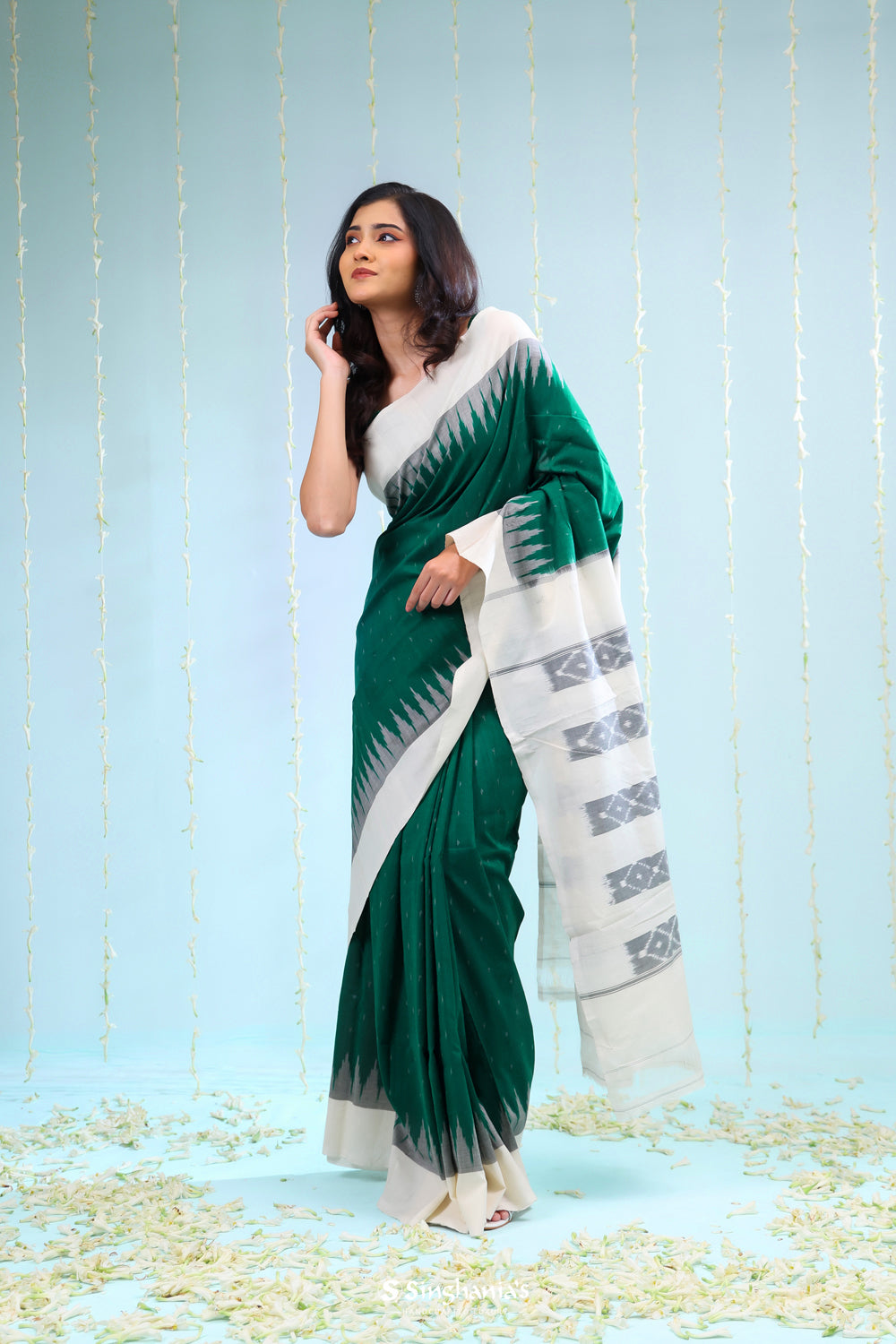 Bottle Green Ikkat Cotton Saree With Contrast Border